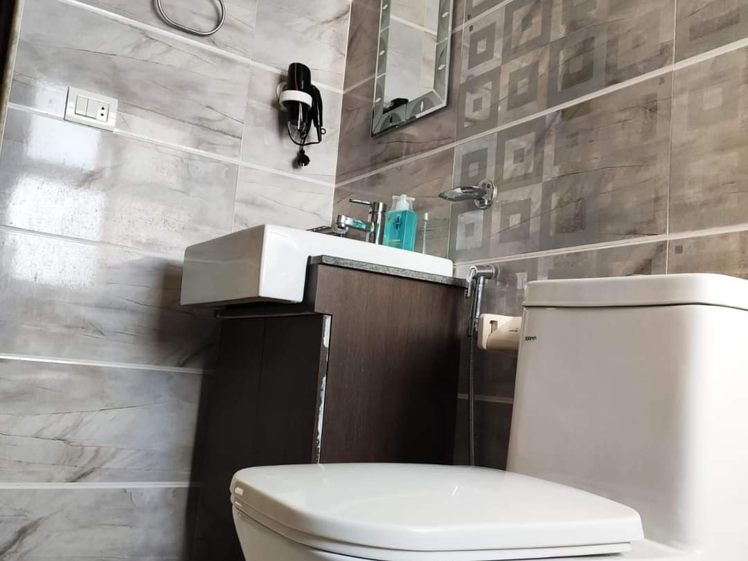 Bathroom Vanity with Sink, Mirror, Hair Dryer & Toiletries