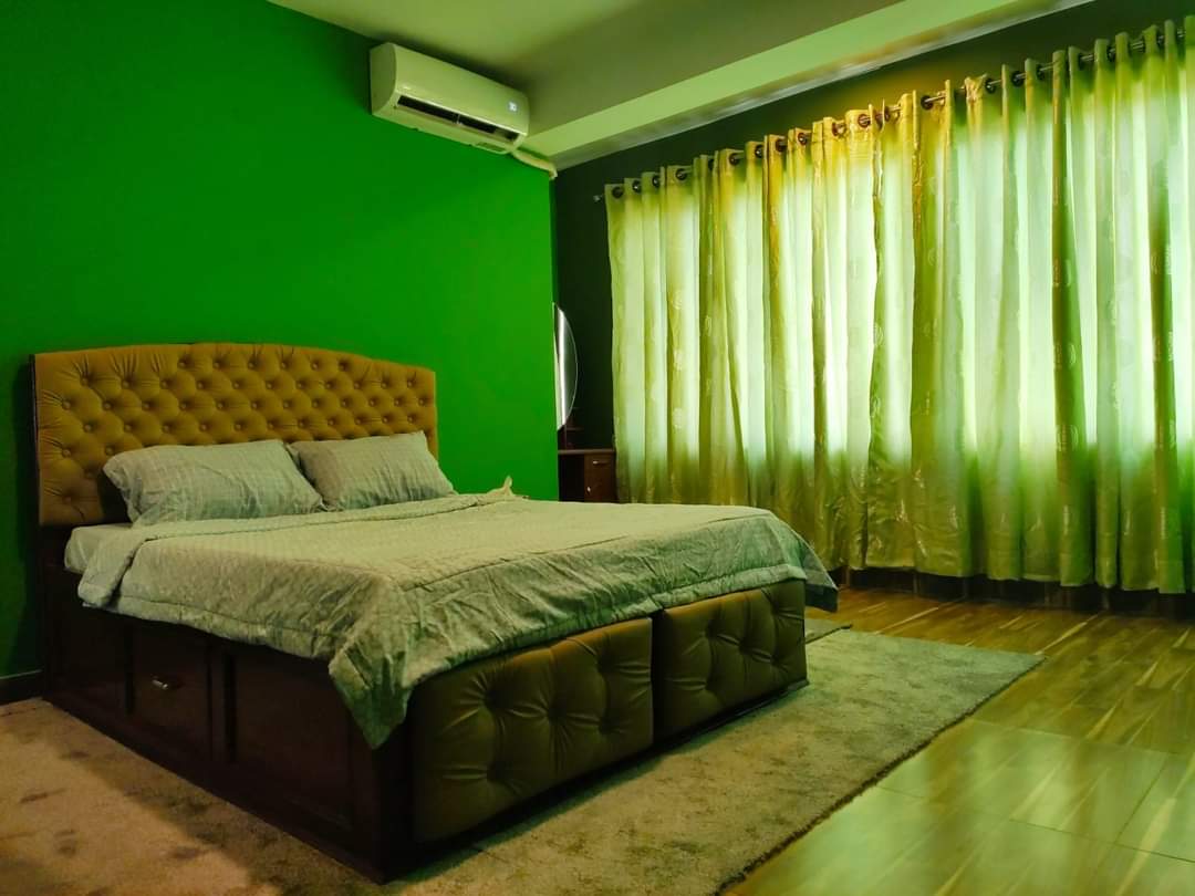 Master Bedroom with Double Bed, AC Unit & Floor-Length Curtains